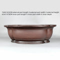 Handmade Chinese style crabapple-shaped purple clay flowerpot for plants.