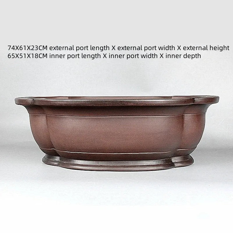 Handmade Chinese style crabapple-shaped purple clay flowerpot for plants.