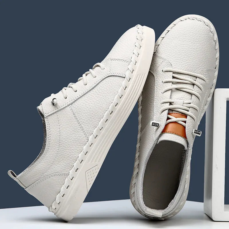 Men's beige cowhide casual sneakers with round toe and stitching details