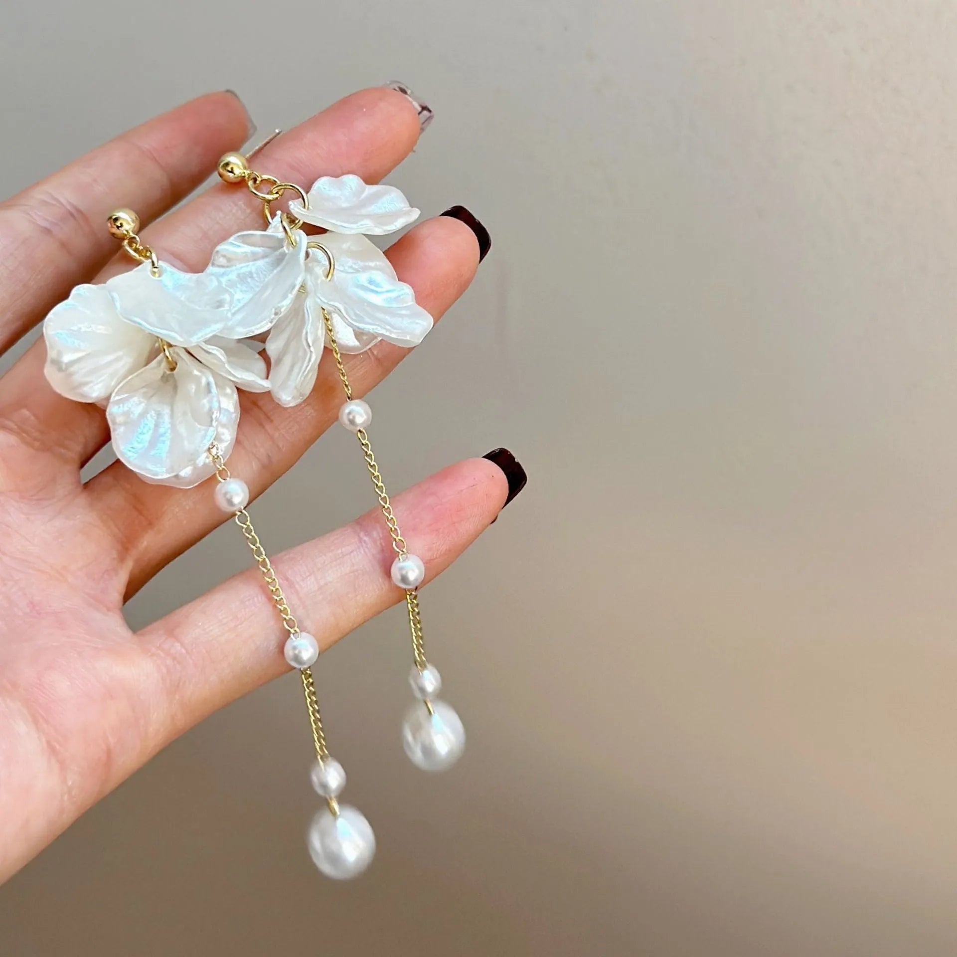 Women's shell pearl and tassel drop earrings with 8.8cm length on acrylic backing