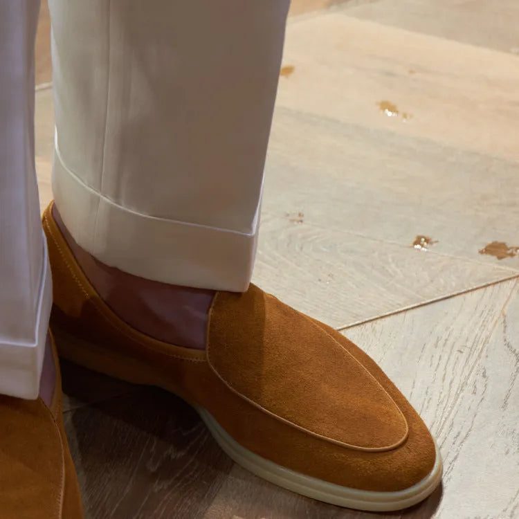 Men's brown genuine leather handmade loafers flat shoes on a white background.