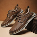 Men's genuine leather casual shoes in black with round toe and lace-up design on rubber sole