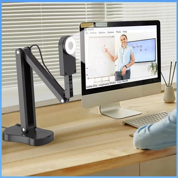 USB auto-focus webcam with microphone for computer video calls and photography.