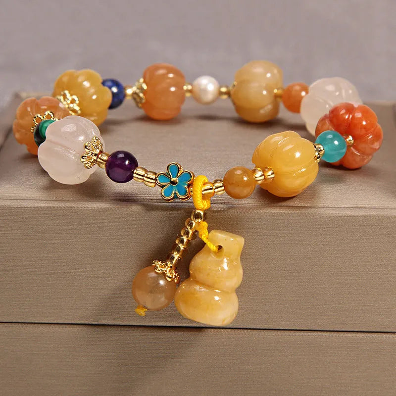 Yellow agate crystal bracelet on a gold silk cord, showing khaki colour and Japanese-Korean style.