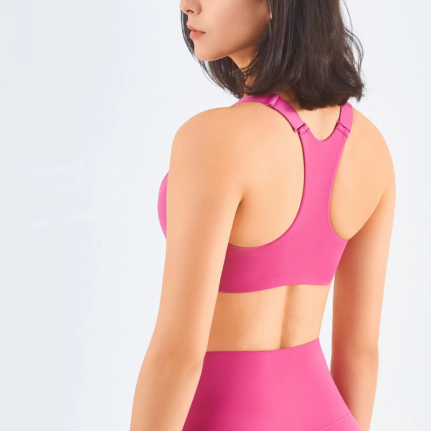 Zip front sports bra in Rhino Grey with racerback and mesh back panel for breathability