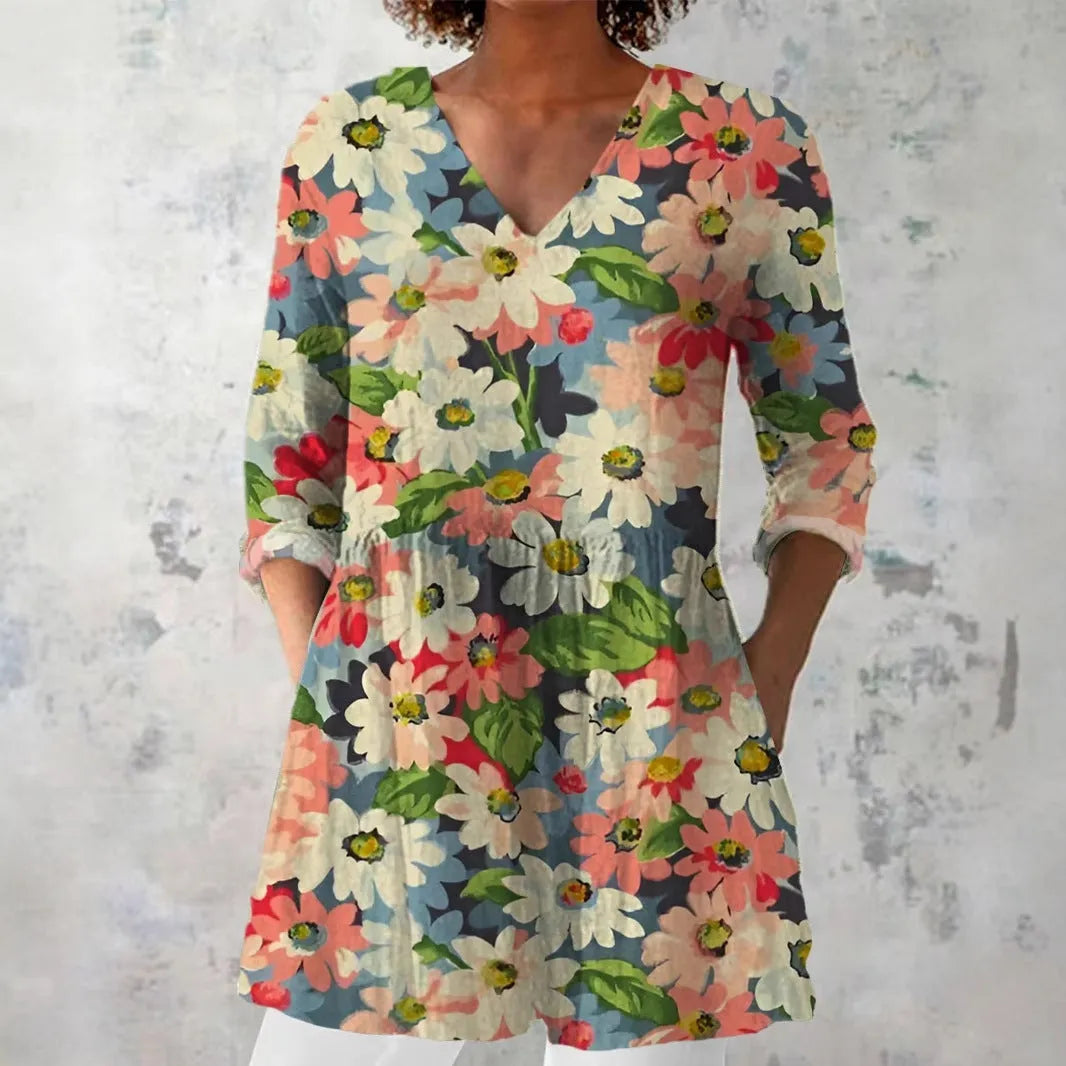 Women's slim fit retro patterned long-sleeved top in a polyester fabric, shown in one of twelve available colourways.
