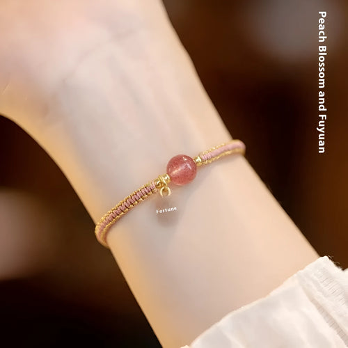 Adjustable red rope bracelet with strawberry quartz beads, showcasing national style design.