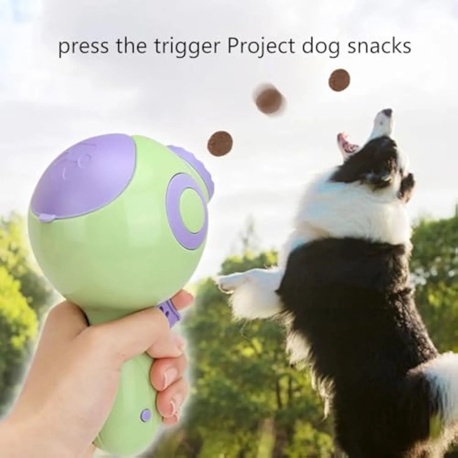 Green dog treat launcher toy for interactive play and training, measuring 15.5 x 9 x 8.5 cm