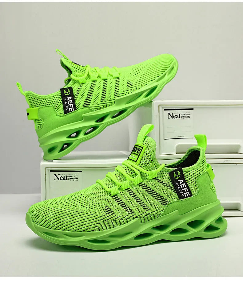 Men's casual running shoes with mesh upper in black colour showing cross strap details and low-top design