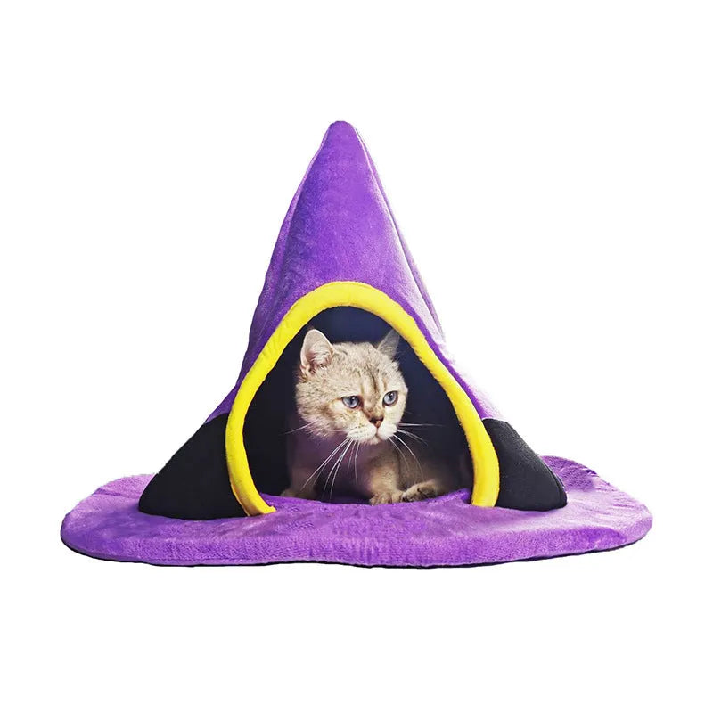 Purple Halloween witch hat shaped cloth cat bed measuring 60 by 46 centimetres.