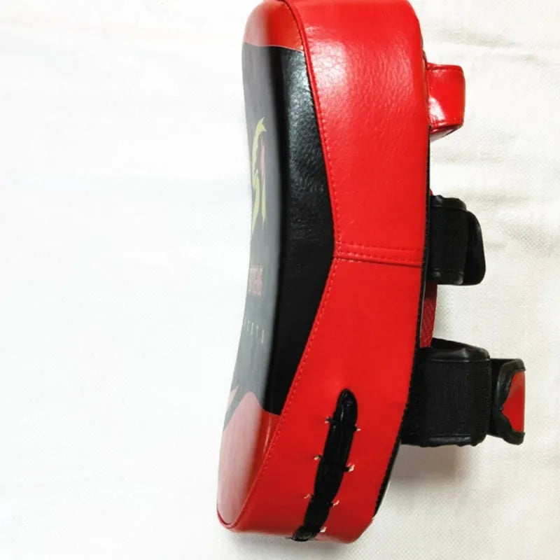 Black and red PU leather hand-held boxing training pad with buckle strap.