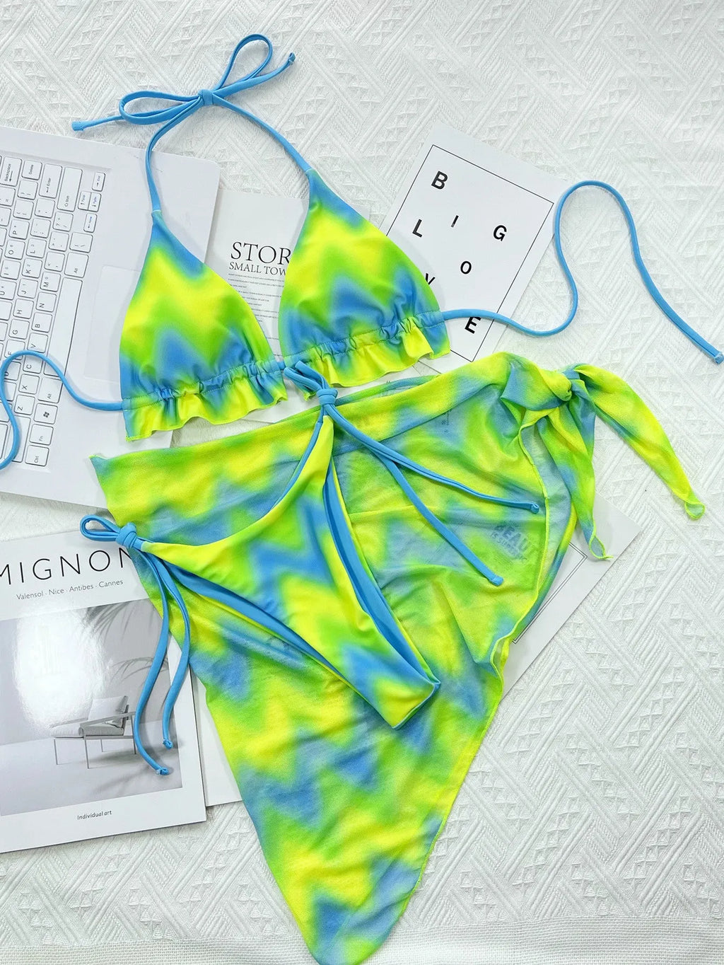 Green tie-dyed women's bikini swimsuit with matching skirt cover-up
