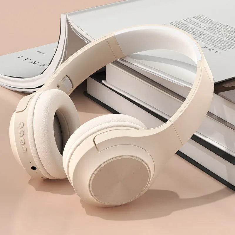 Creative design wireless Bluetooth headset shown in Ivory White, Chalk Black, and Youth Green colour options.