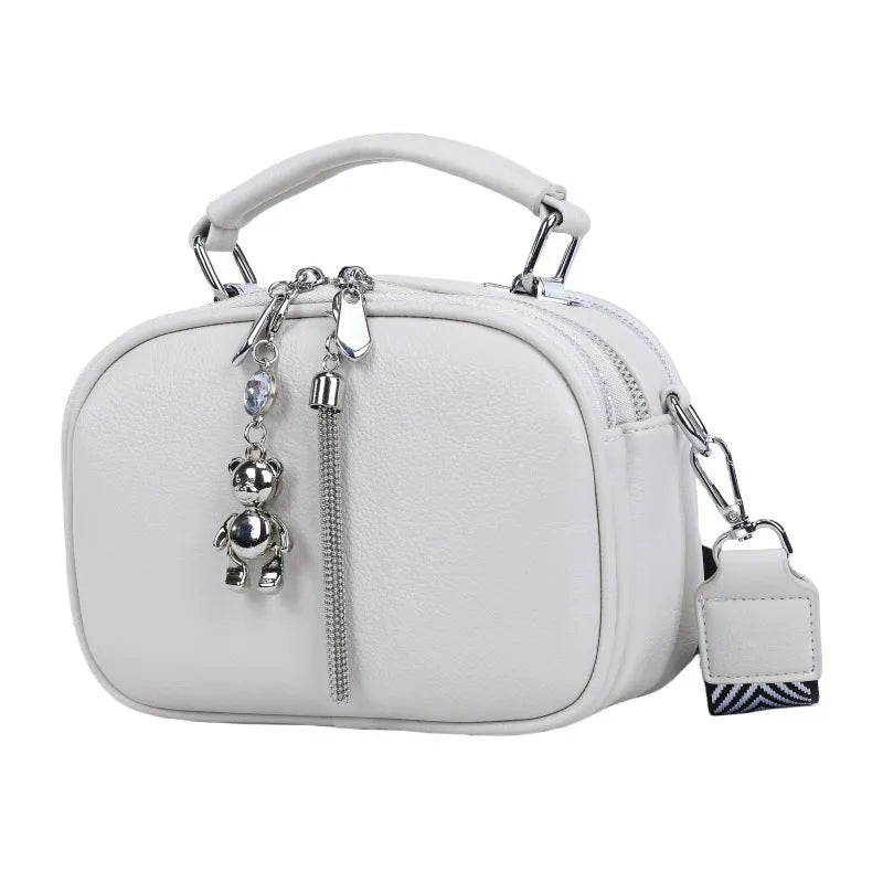 Women's stitching small square bag oval design showing mobile phone compartment and double shoulder straps