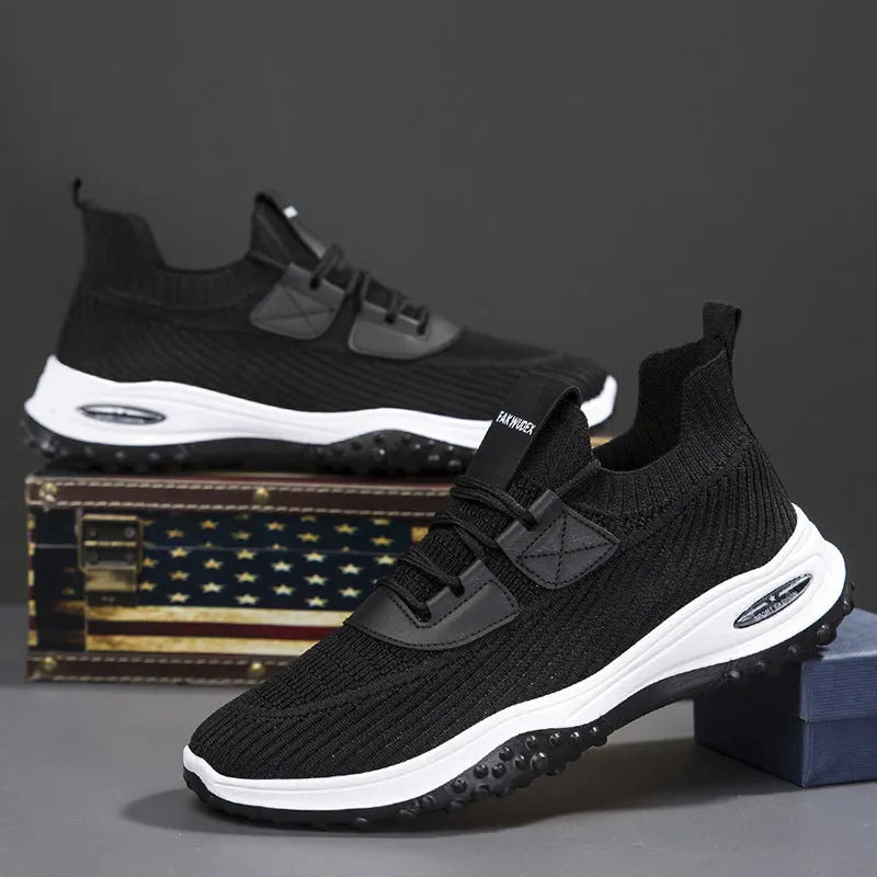 Black Flyknit low-top running shoes with mesh lining and a flat plastic sole.