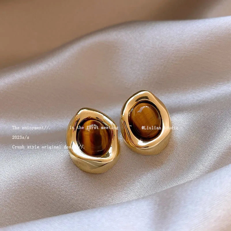 Three pairs of handmade electroplated alloy holiday earrings with geometric shapes and tassel elements