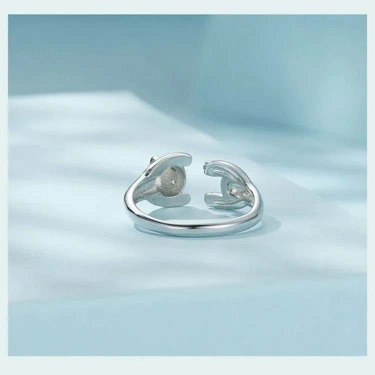 Adjustable sterling silver panda open ring bracelet with white gold plating on model finger