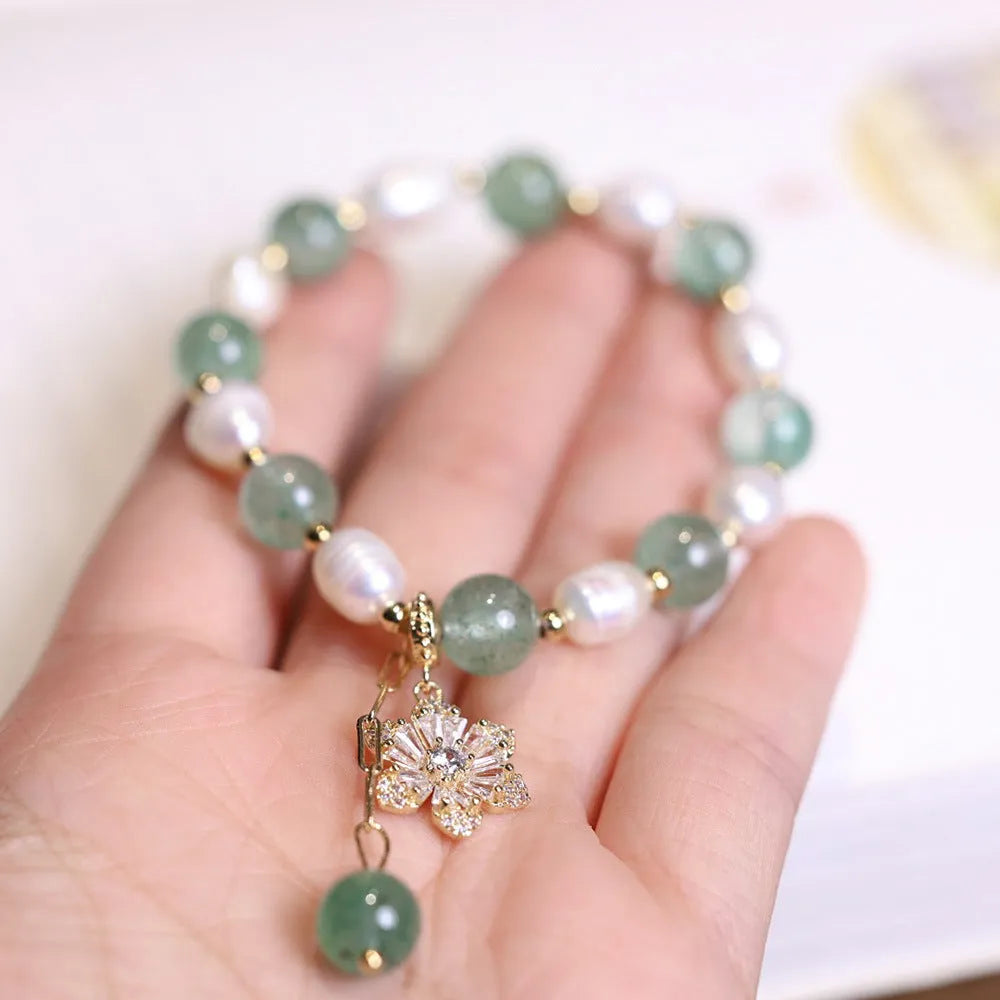 Green freshwater pearl bracelet with geometric strawberry beads and Chinese knot closure