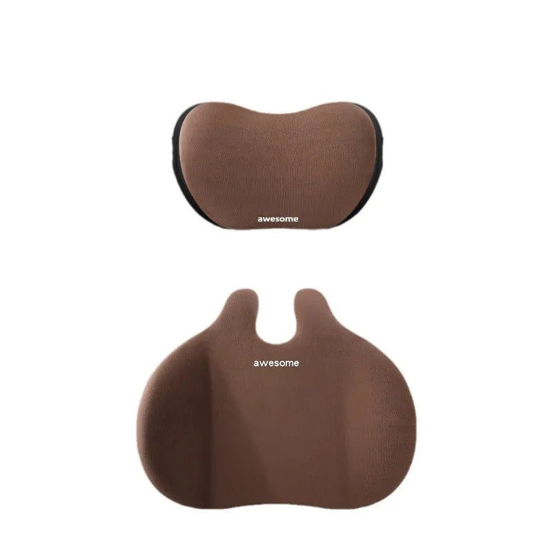 Cow head style black cloth car headrest pillow and matching lumbar support pillow.