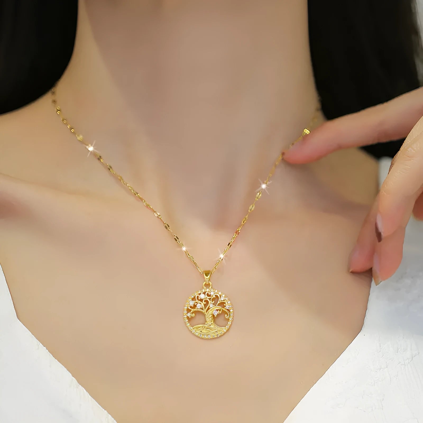 Gold-plated adjustable necklace with a mother of pearl and full rhinestone zircon cross pendant on a lip chain.