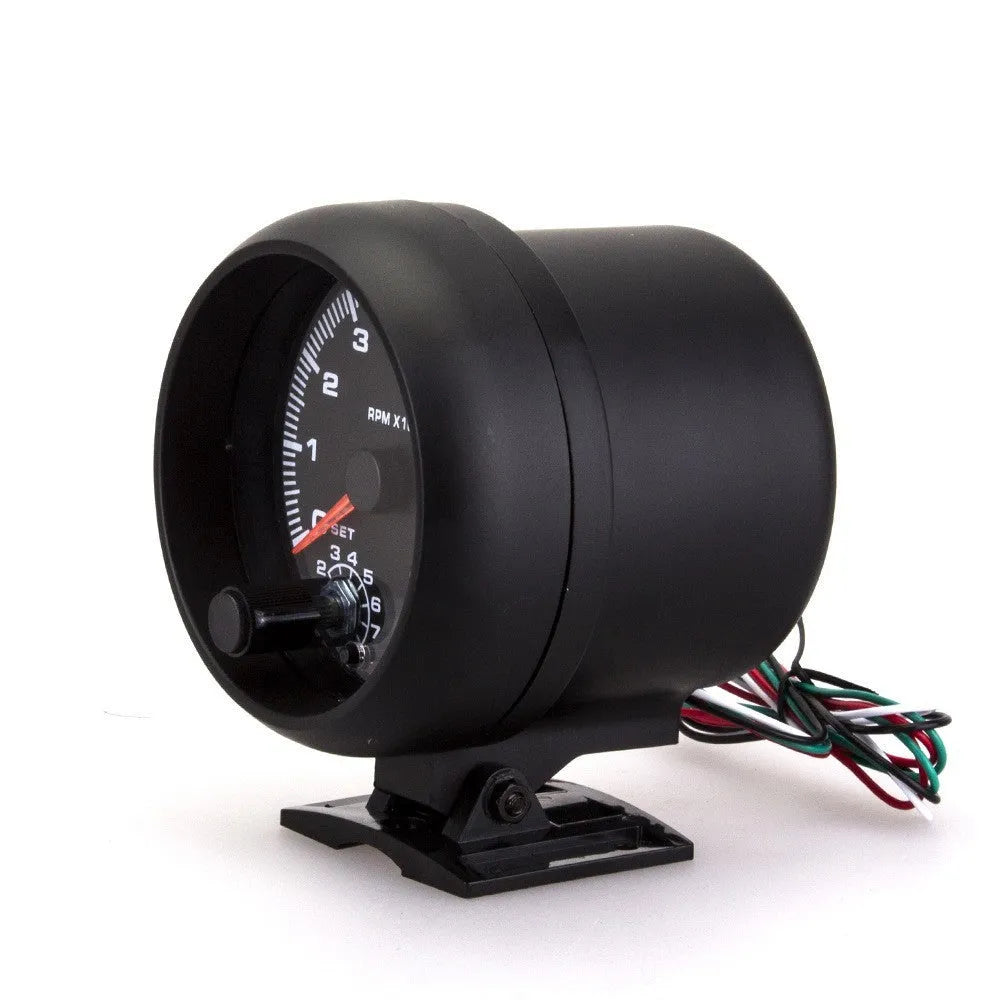 Black automotive tachometer with blue light pointer display for RPM measurement