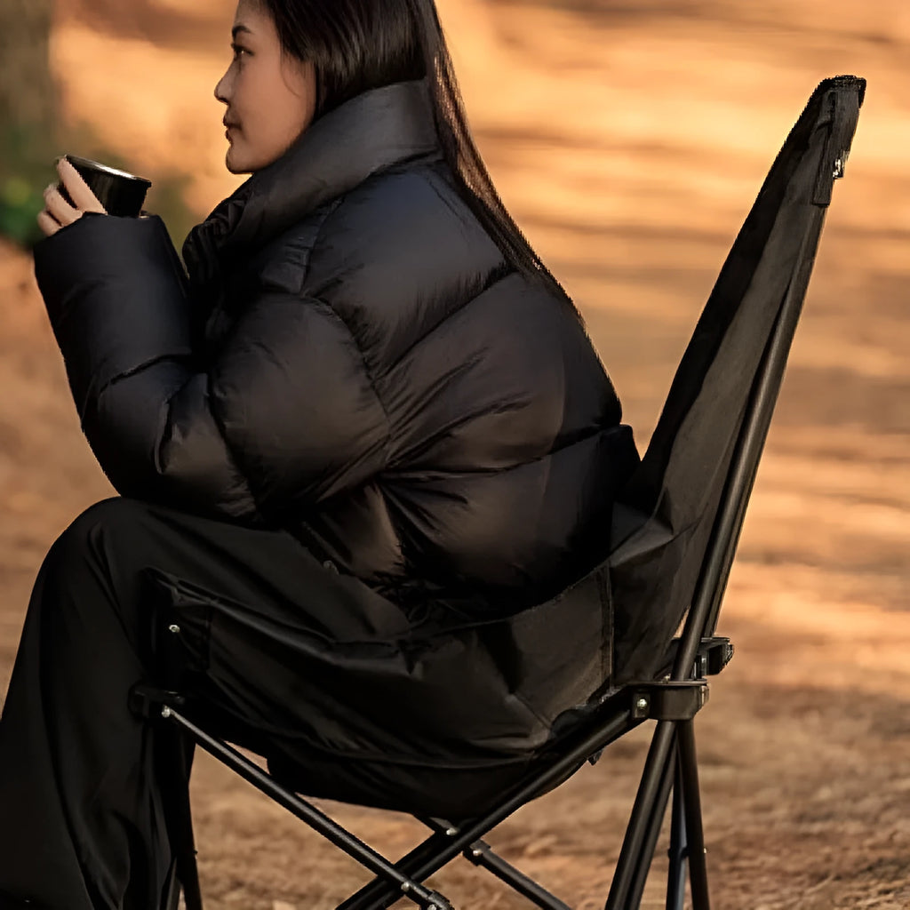 Night Black Oxford cloth portable folding moon camping chair with a thickened seat, shown in a folded position.