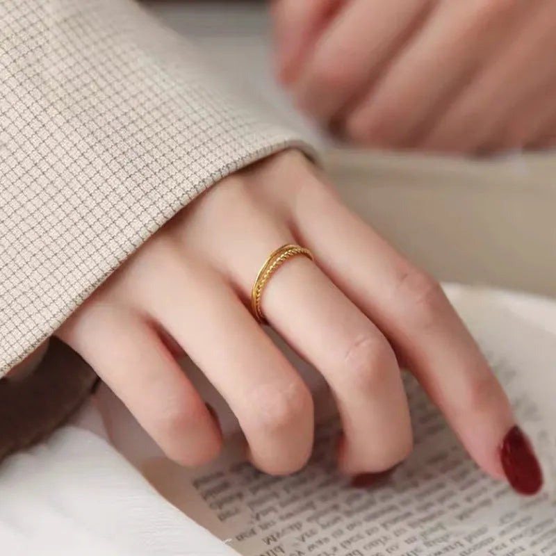 Women's brass gold plated ring showing simple bracelet and twist design options in glossy and matte finishes