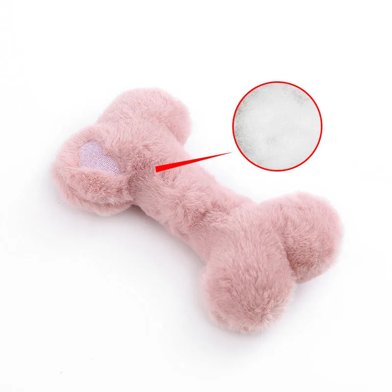 Blue heart-shaped love bone plush dog toy with a squeaker for interactive pet play.
