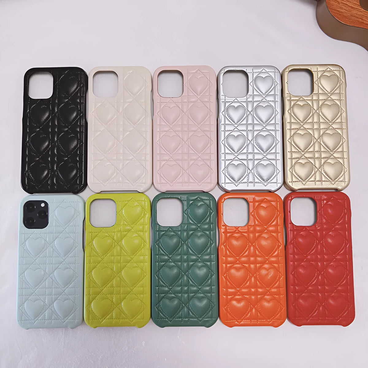 Leather silicone iPhone case with heart and plaid pattern in milk blue, pink or black