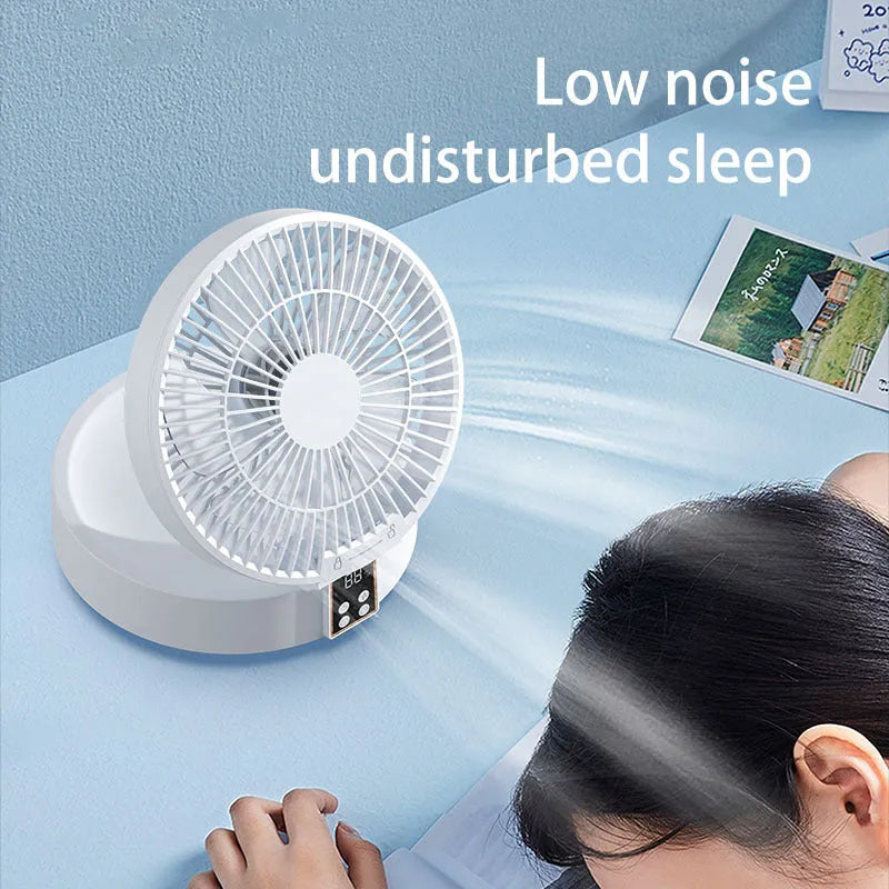 White portable folding fan with remote control showing 90° adjustable head and USB charging port