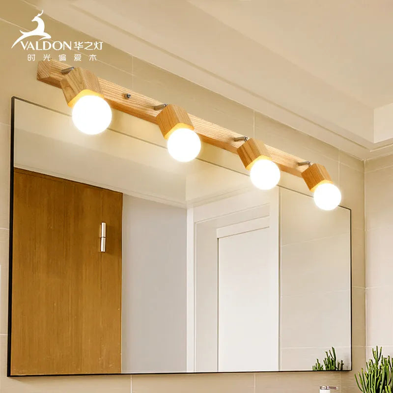 Single head mirror cabinet wall lamp with a 24cm diameter frame.