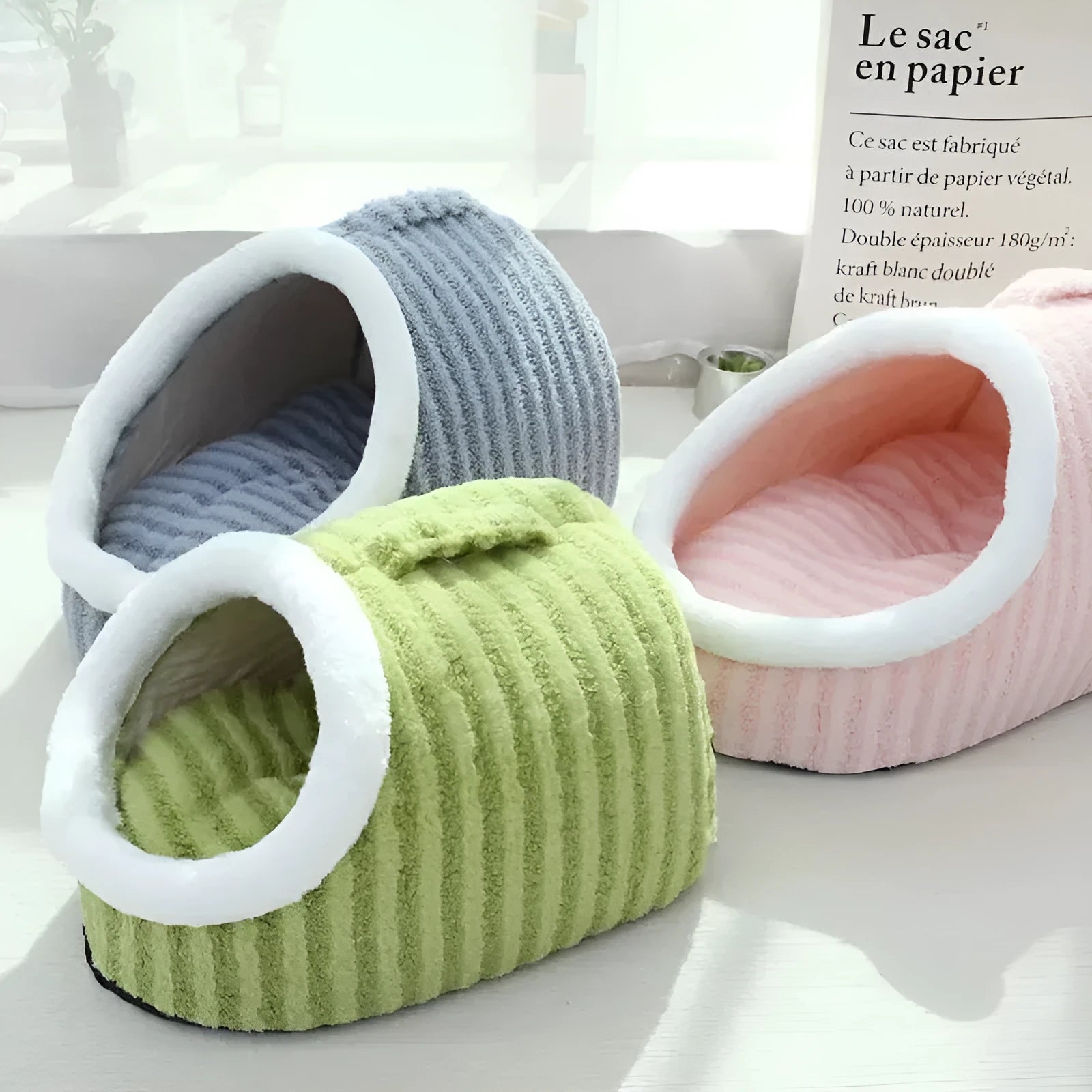 Striped thickened 3D dog bed with enclosed hole design and removable sponge mattress in blue, green, pink, or yellow.
