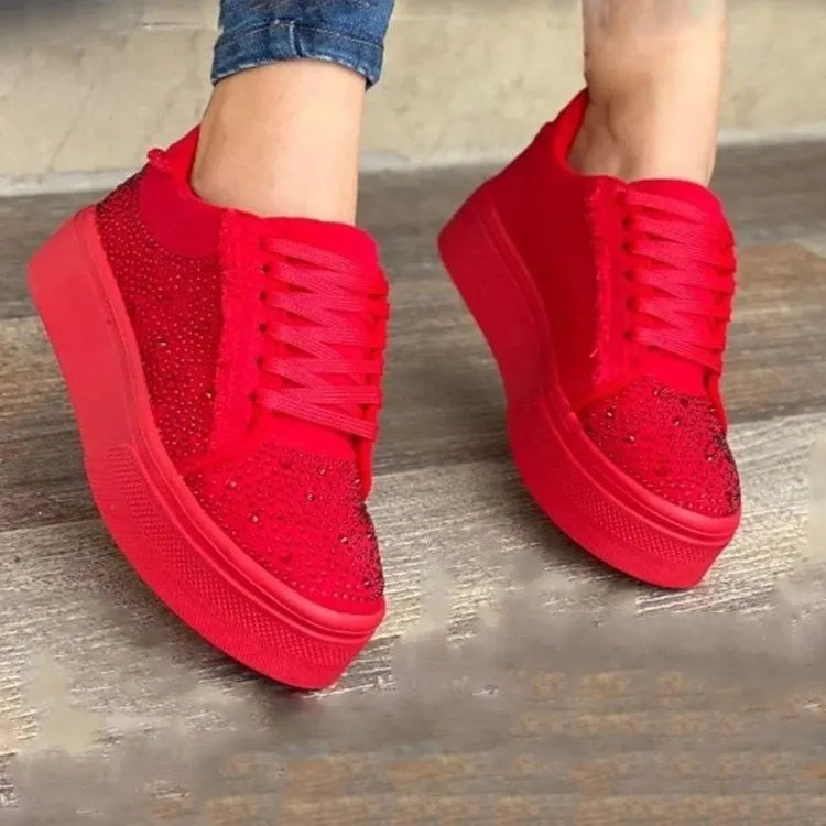 Plus size women's black casual sports shoes with rhinestone detail, flat rubber sole, and lace-up front.