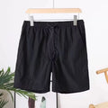 Men's quick-drying straight-leg sports shorts in polyester blend fabric, shown in multiple colour options