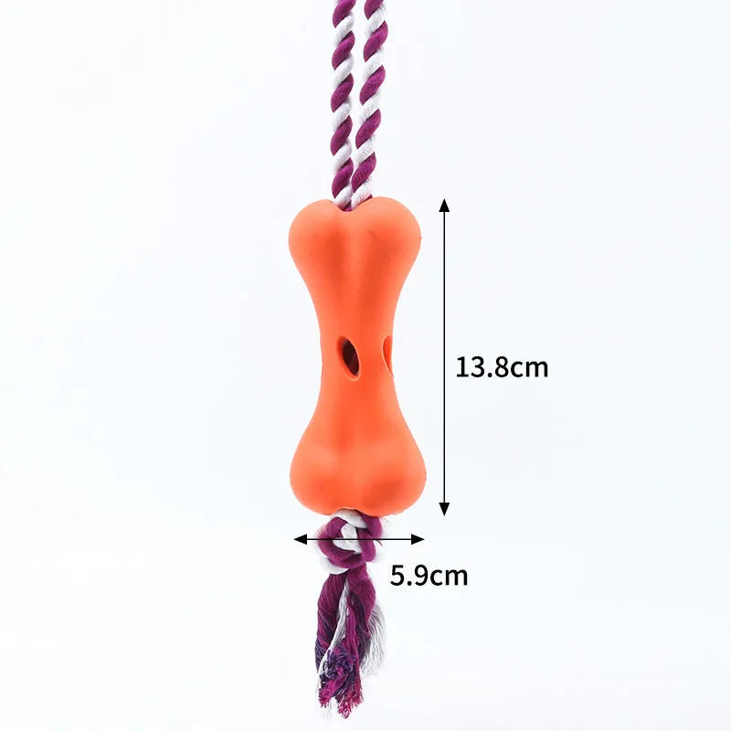 Green porous bone dog toy with knotted rope ends and food cavity for cheese or beef strips