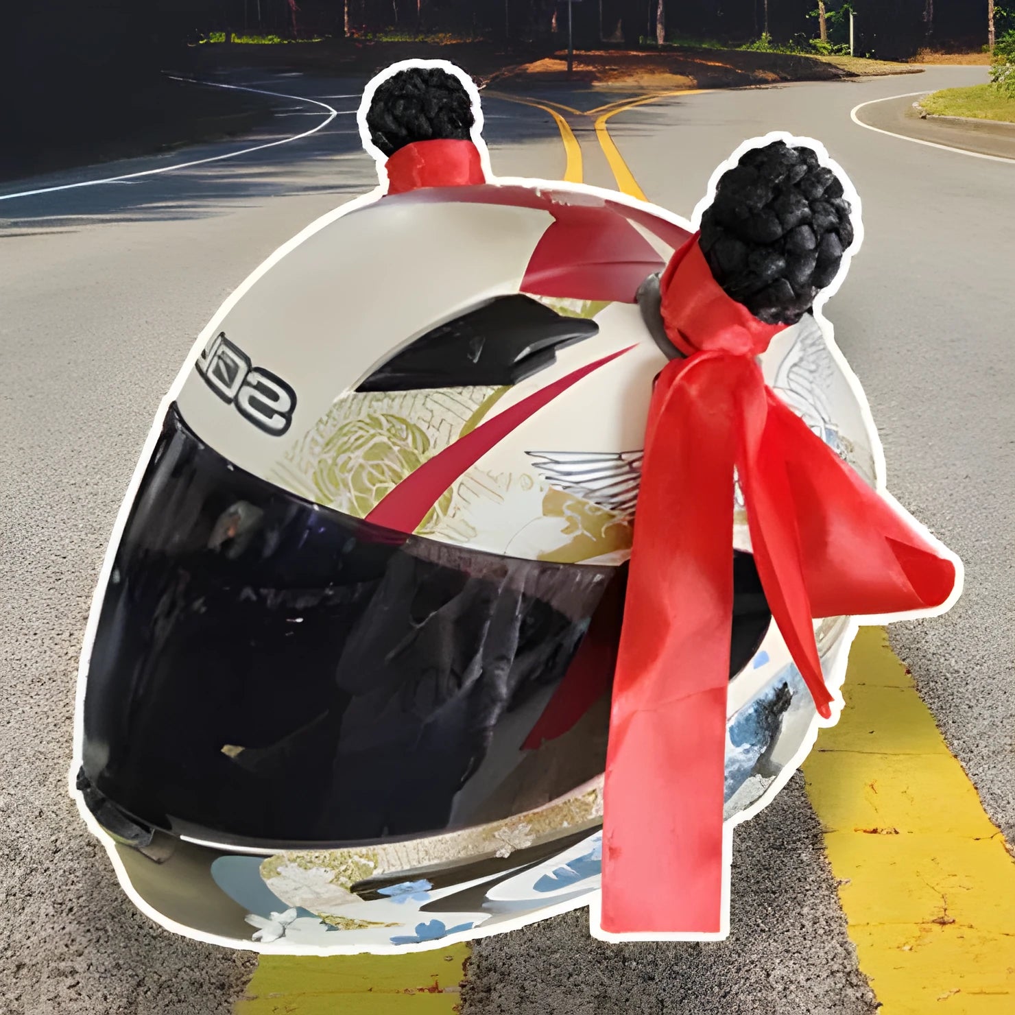 Pair of black braid-style helmet decorations, 8cm tall, shown next to a sheet of non-marking adhesive pads for motorcycle helmet customisation.