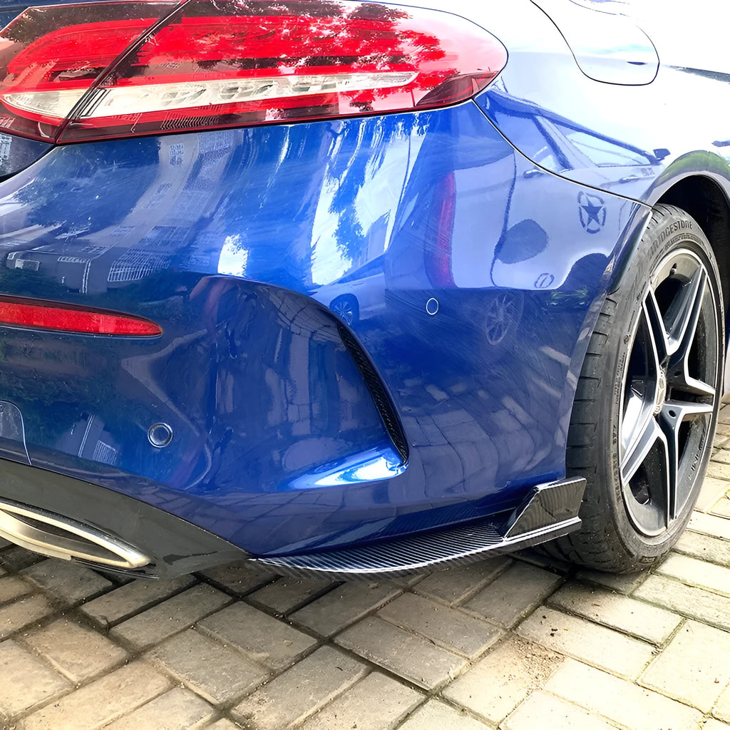 PP plastic car rear corner protectors in piano black and carbon fibre pattern finishes shown as a left and right set