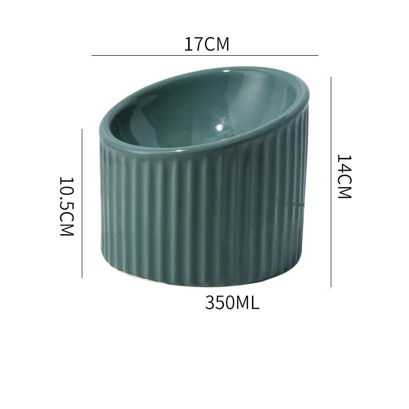 Elevated ceramic cat bowl in light green colour with tilted round design for comfortable feeding