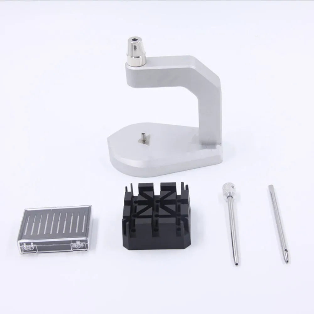 Silver-coloured tool steel press strap removal tool for watches and jewellery.