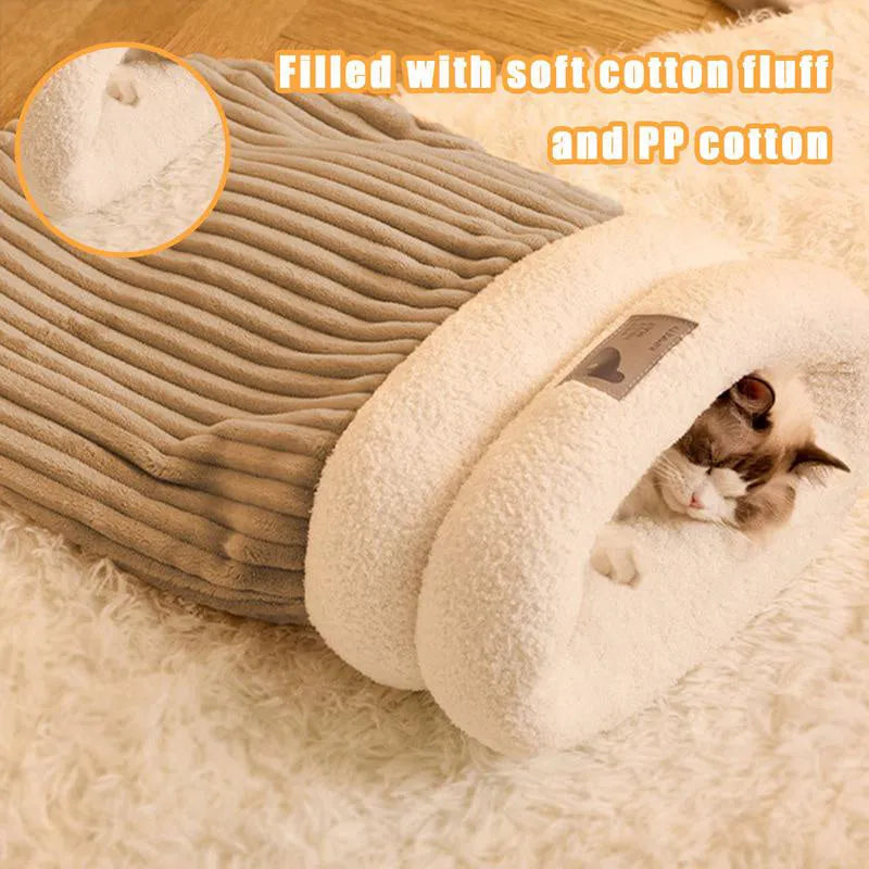 Brown semi-enclosed cat sleeping bag with plush cotton velvet and lambswool construction on a wooden floor.