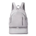 Women's casual backpack in black with curved adjustable shoulder straps showing stitching details