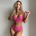 Women's rose red plaid print high-waisted bikini with split leg briefs and matching top.
