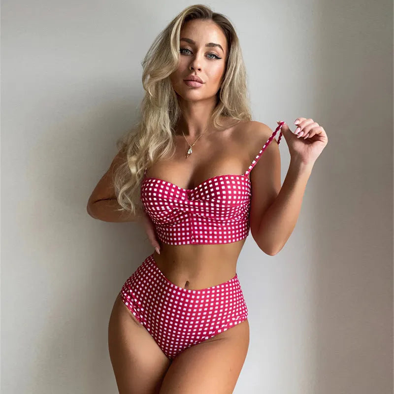 Women's rose red plaid print high-waisted bikini with split leg briefs and matching top.
