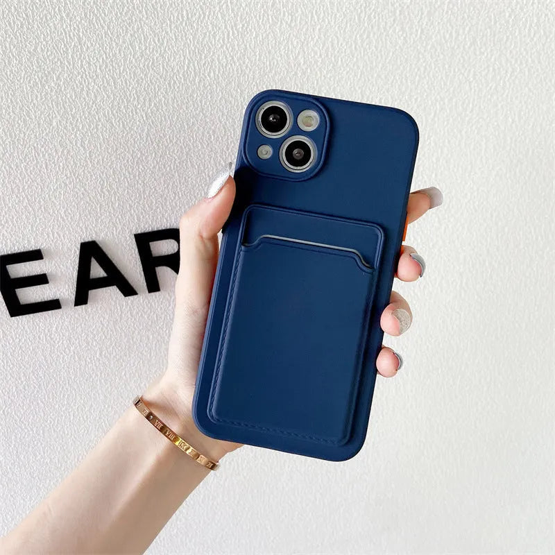 Sky blue colour block silicone iPhone case with a visible card slot on the back.