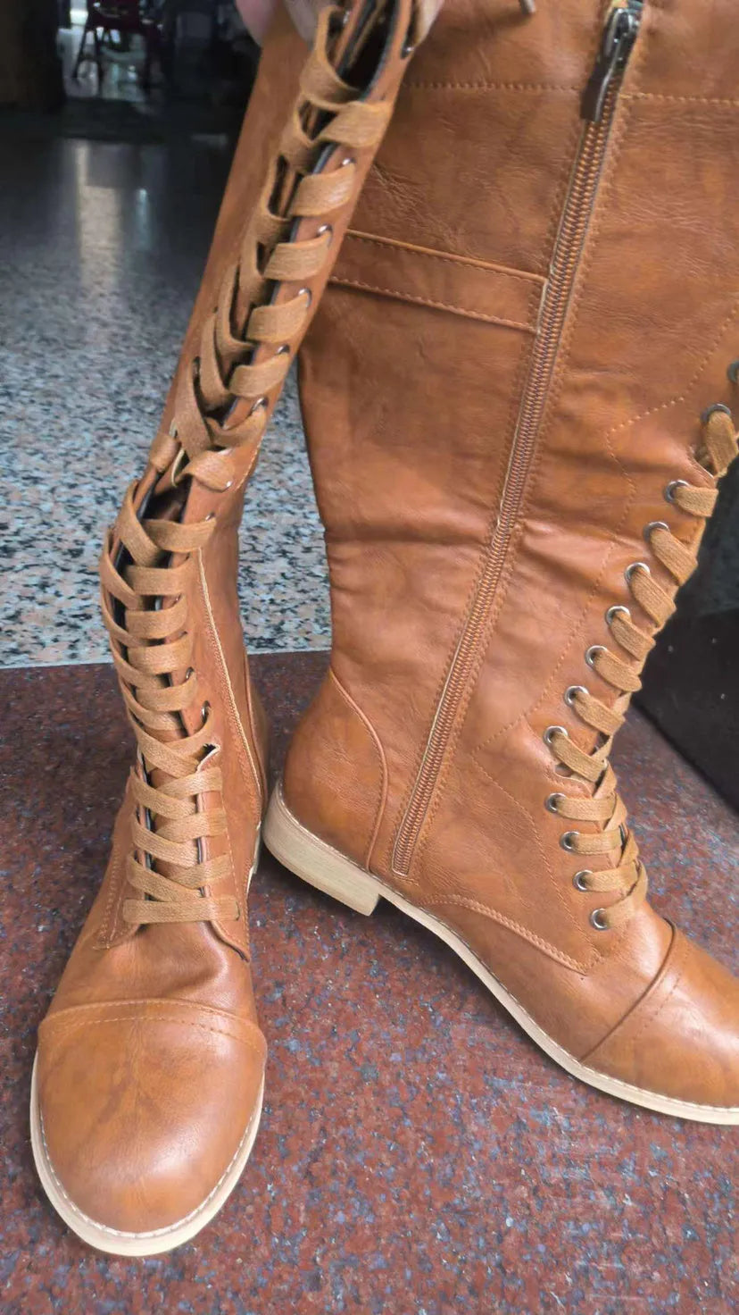 Women's knight boots with cross strap design in artificial PU material
