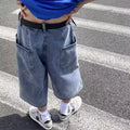 Men's blue washed denim pirate shorts with a cropped length, high waist, and straight leg.