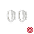 Small round sterling silver geometric stud earrings with a circle design in a gold or silver finish.