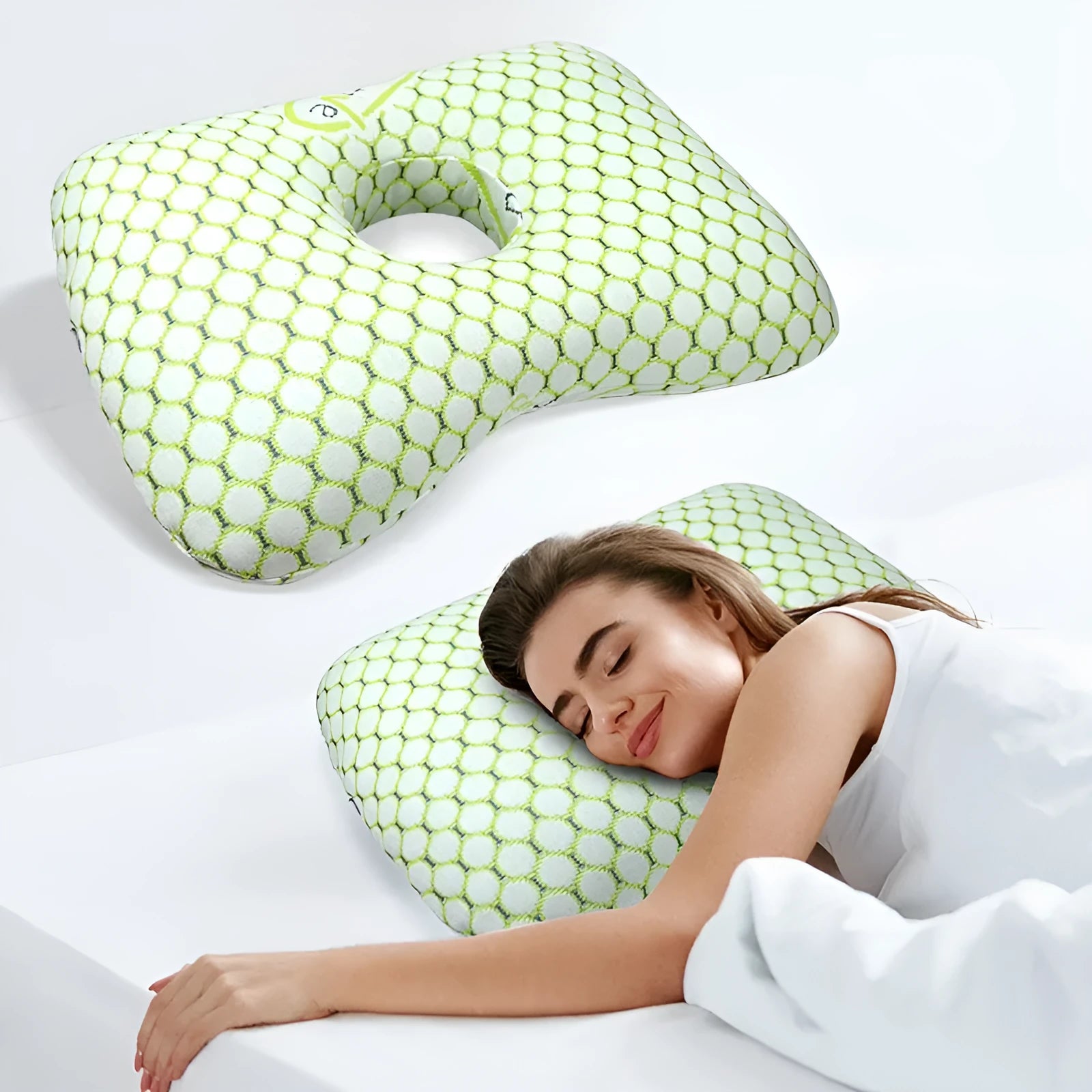 Beauty salon single hole ear pillow in grey on a treatment bed.