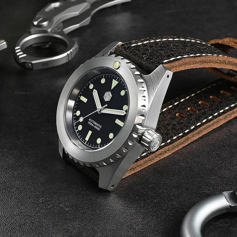 Men's stainless steel automatic diving watch with black dial, green luminous markers, leather strap, 41mm case, 200m water resistant