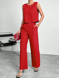 Women's red sleeveless top and wide leg pants two-piece casual set on a hanger.
